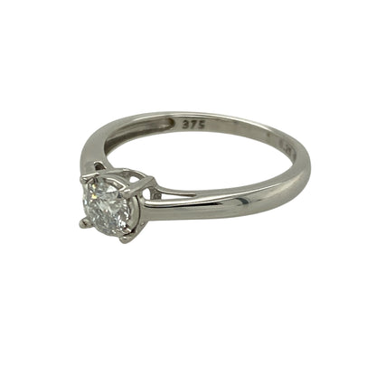 Bring classic sparkle and elegant simplicity to your collection with this pre-owned 9ct white gold diamond solitaire ring—an attractive piece offering timeless style and refined brilliance.

Design: This size M ring features an illusion-set brilliant-cut diamond of approximately 0.25ct, designed to maximise light and create a larger, more radiant appearance.
Material: Made from 9-carat white gold, the polished finish enhances the diamond’s bright sparkle while providing a clean, modern look.