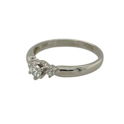 Bring timeless elegance and refined sparkle to your collection with this pre-owned 14ct white gold diamond trilogy ring—an exquisite piece offering classic beauty and symbolic meaning.

Design: This size M ring features a trilogy arrangement with a 0.21ct centre diamond framed by a diamond on each side, creating a balanced and graceful look that represents past, present, and future.