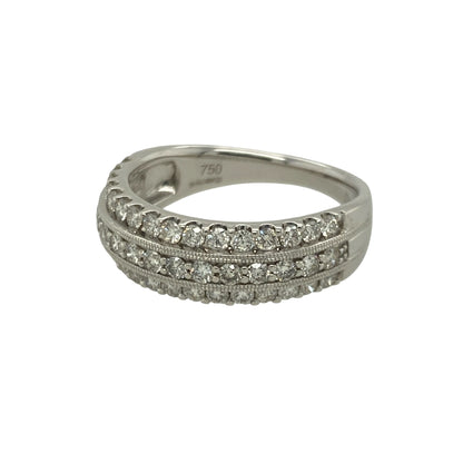 Bring bold brilliance and luxurious style to your collection with this pre-owned 18ct yellow gold three-row diamond band ring—an impressive piece offering radiant sparkle and timeless elegance.

Design: This size N band features a 7mm wide front adorned with three rows of dazzling diamonds, creating a striking light-catching display with exceptional presence.
Material: Made from 18-carat yellow gold, the rich, warm tone beautifully enhances the brightness and fire of the diamonds.