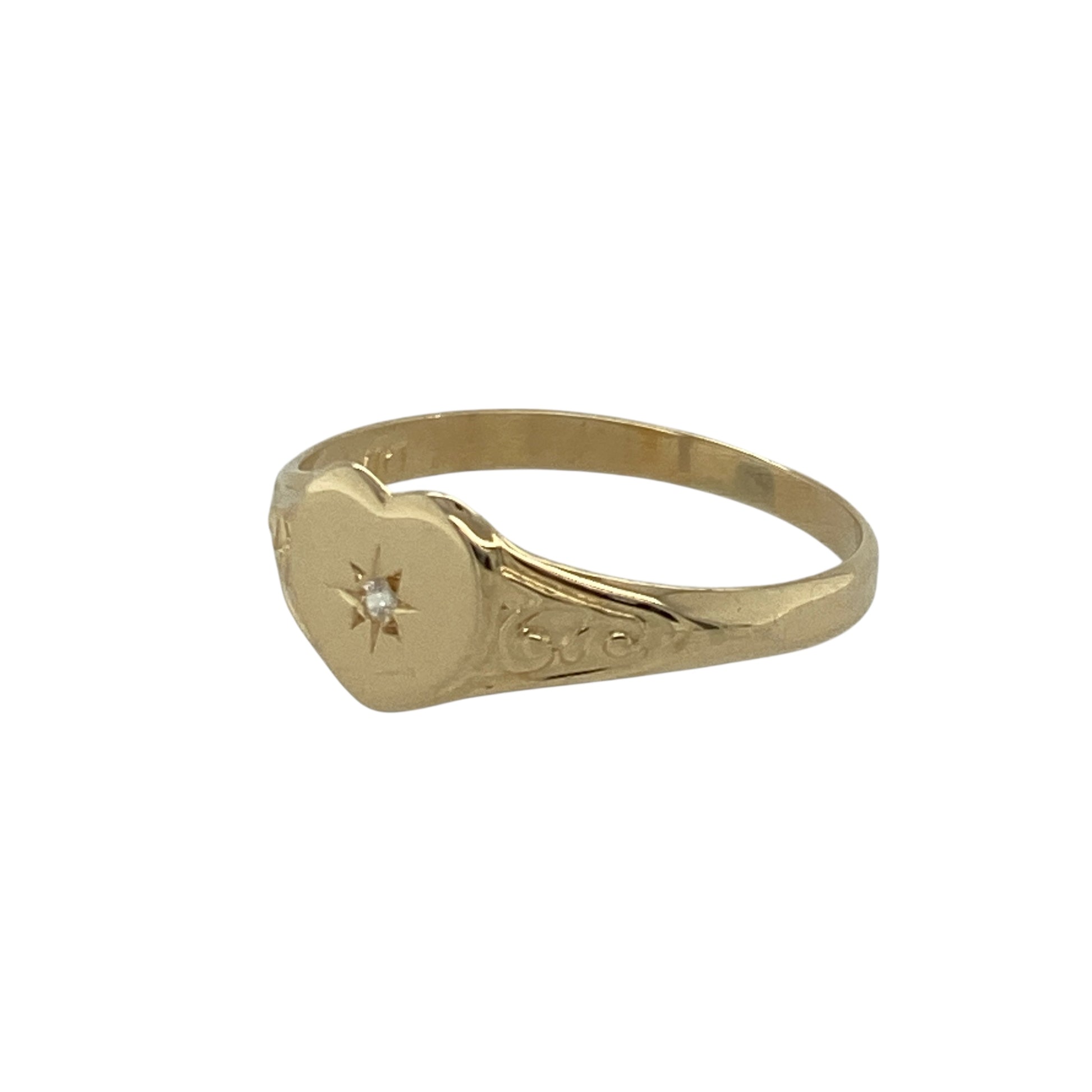Bring sweet sparkle and warm golden charm to your collection with this pre-owned 9ct yellow gold diamond heart signet ring—an elegant piece offering delicate detail and timeless appeal.

Design: This size I ring features a 6mm high heart-shaped signet front, accented with a sparkling diamond for a subtle, romantic touch.
Material: Made from 9-carat yellow gold, the polished finish enhances its soft, radiant shine and complements the diamond’s gentle brilliance.