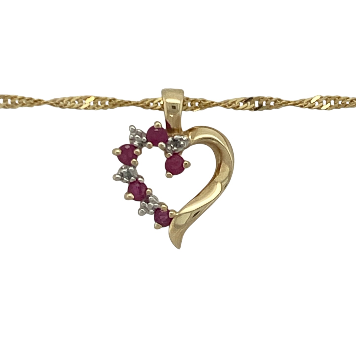 Bring vibrant colour and delicate sparkle to your collection with this pre-owned 9ct yellow gold ruby and diamond open heart pendant necklace—an elegant piece offering timeless charm and romantic style.

Design: This 1.8cm pendant features an open heart shape adorned with rubies and diamonds, creating a beautifully balanced display of rich red tones and bright sparkle.
