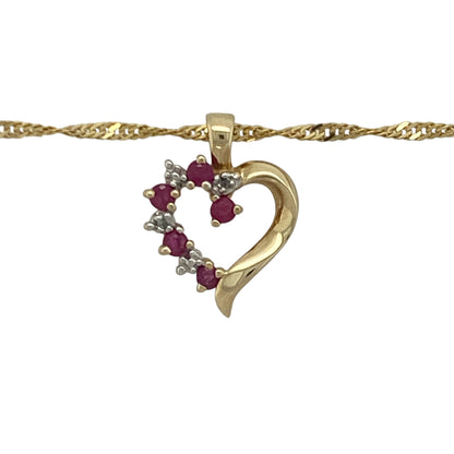 Bring vibrant colour and delicate sparkle to your collection with this pre-owned 9ct yellow gold ruby and diamond open heart pendant necklace—an elegant piece offering timeless charm and romantic style.

Design: This 1.8cm pendant features an open heart shape adorned with rubies and diamonds, creating a beautifully balanced display of rich red tones and bright sparkle.