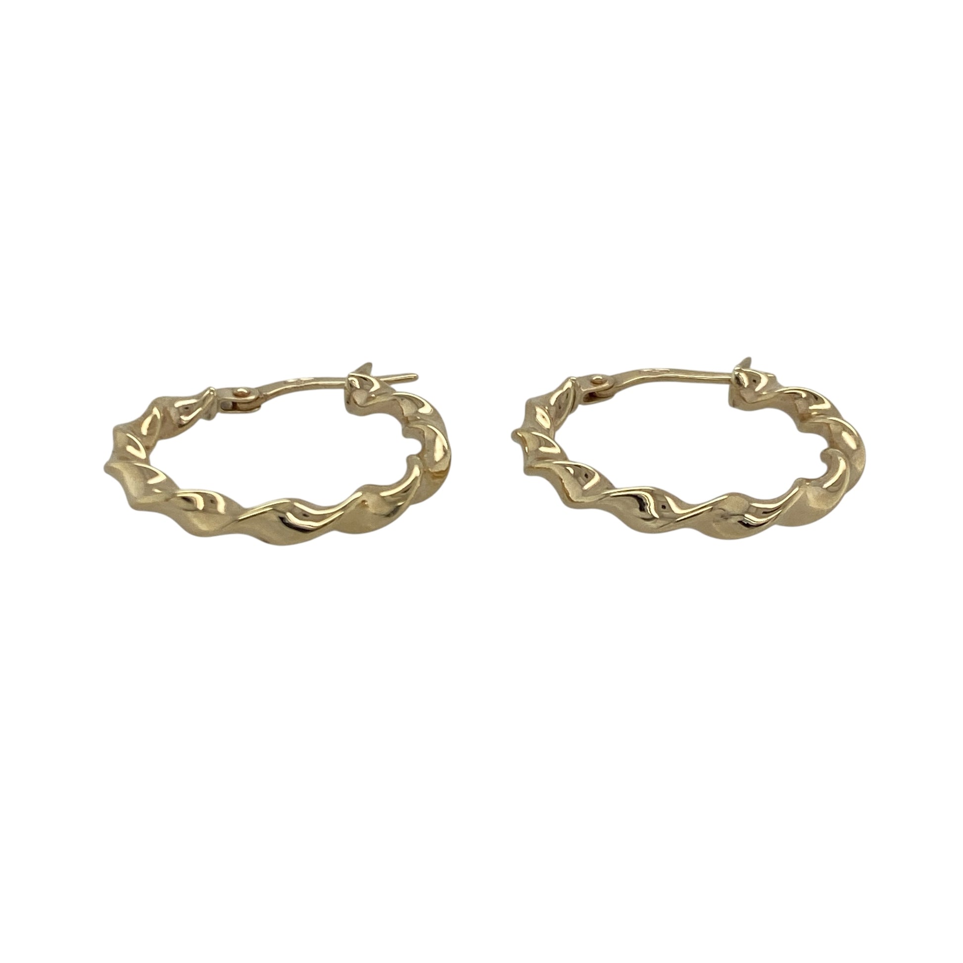 Bring elegant movement and warm golden shine to your collection with these pre-owned 9ct yellow gold ribbon-twisted creole earrings—an attractive pair offering timeless charm and refined style.

Design: These hoop creole earrings feature a delicate ribbon-twist pattern, creating a flowing, light-catching look with subtle texture.
Material: Made from 9-carat yellow gold, the polished finish enhances their radiant tone and highlights the graceful twist design.