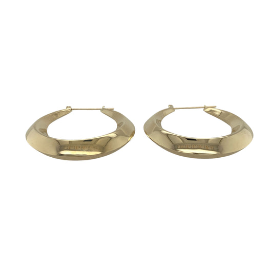 Bring classic elegance and warm golden shine to your collection with these pre-owned 9ct yellow gold plain oval creole earrings—an attractive pair offering timeless sophistication and everyday versatility.

Design: These oval hoop creole earrings feature a smooth, plain finish, creating a clean and polished look suitable for any occasion.
Material: Made from 9-carat yellow gold, the polished surfaces enhance their rich golden tone and refined simplicity.