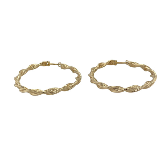 Bring graceful movement and warm golden shine to your collection with these pre-owned 9ct yellow gold ribbon-twisted creole earrings—an elegant pair offering timeless style and refined detail.

Design: These hoop creole earrings feature a flowing ribbon-twist pattern, creating soft curves and light-catching texture for a beautifully feminine look.
Material: Made from 9-carat yellow gold, the polished surfaces enhance their rich golden tone and highlight the twisting design.