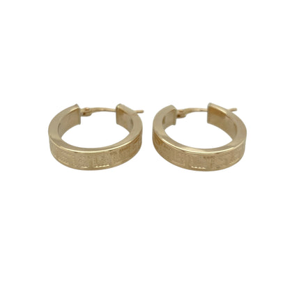 Bring bold pattern and warm golden shine to your collection with these pre-owned 9ct yellow gold Greek key creole earrings—an elegant pair offering timeless style and distinctive detail.

Design: These oval hoop creole earrings feature a classic Greek key pattern, adding geometric interest and a touch of cultural elegance to their traditional shape.
Material: Made from 9-carat yellow gold, the polished surfaces enhance the rich golden tone and highlight the intricate patterning.
