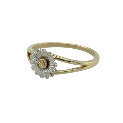 Bring sweet charm and delicate detail to your collection with this pre-owned 9ct yellow and white gold Clogau daisy ring—an elegant piece offering feminine style and timeless appeal.

Design: This size L ring features an 8mm high daisy motif crafted in mixed yellow and white gold, creating a soft, graceful floral design with subtle contrast.
Material: Made from 9-carat yellow and white gold, the polished finish enhances the warm and cool tones, highlighting the gentle detailing of the flower.