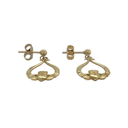 Bring heartfelt symbolism and warm golden shine to your collection with these pre-owned 9ct yellow gold Claddagh drop earrings—an elegant pair offering timeless tradition and refined detail.

Design: These drop earrings feature the classic Claddagh motif of hands, heart, and crown, representing friendship, love, and loyalty in a beautifully crafted design.
Material: Made from 9-carat yellow gold, the polished finish enhances the rich golden tone and highlights the traditional detailing.