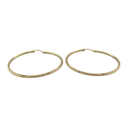 Bring bold shine and classic golden style to your collection with these pre-owned 9ct yellow gold large hoop creole earrings—an elegant pair offering timeless simplicity and confident presence.

Design: These large hoop creole earrings feature a smooth, plain finish, creating a clean and polished look that suits any outfit or occasion.
Material: Made from 9-carat yellow gold, the polished surfaces enhance their rich golden tone and refined minimal style.