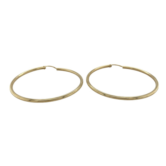 Bring bold shine and classic golden style to your collection with these pre-owned 9ct yellow gold large hoop creole earrings—an elegant pair offering timeless simplicity and confident presence.

Design: These large hoop creole earrings feature a smooth, plain finish, creating a clean and polished look that suits any outfit or occasion.
Material: Made from 9-carat yellow gold, the polished surfaces enhance their rich golden tone and refined minimal style.
