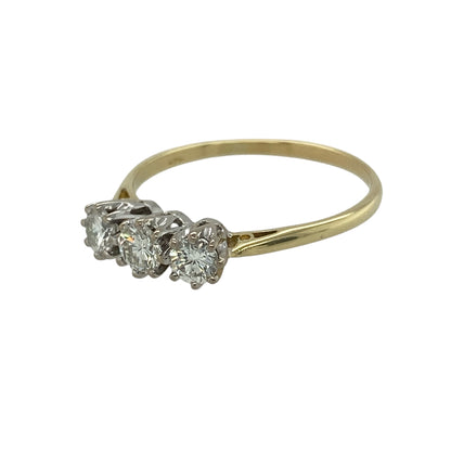 Bring timeless brilliance and elegant simplicity to your jewellery collection with this pre-owned 18ct yellow gold diamond trilogy ring — a classic piece full of sparkle and meaningful symbolism.

Design: The ring displays three radiant diamonds in a traditional trilogy layout, offering balanced sparkle and a sophisticated, understated look.
Material: Made from 18ct yellow gold, the rich polished finish enhances the warmth of the band and beautifully complements the brightness of the diamonds.