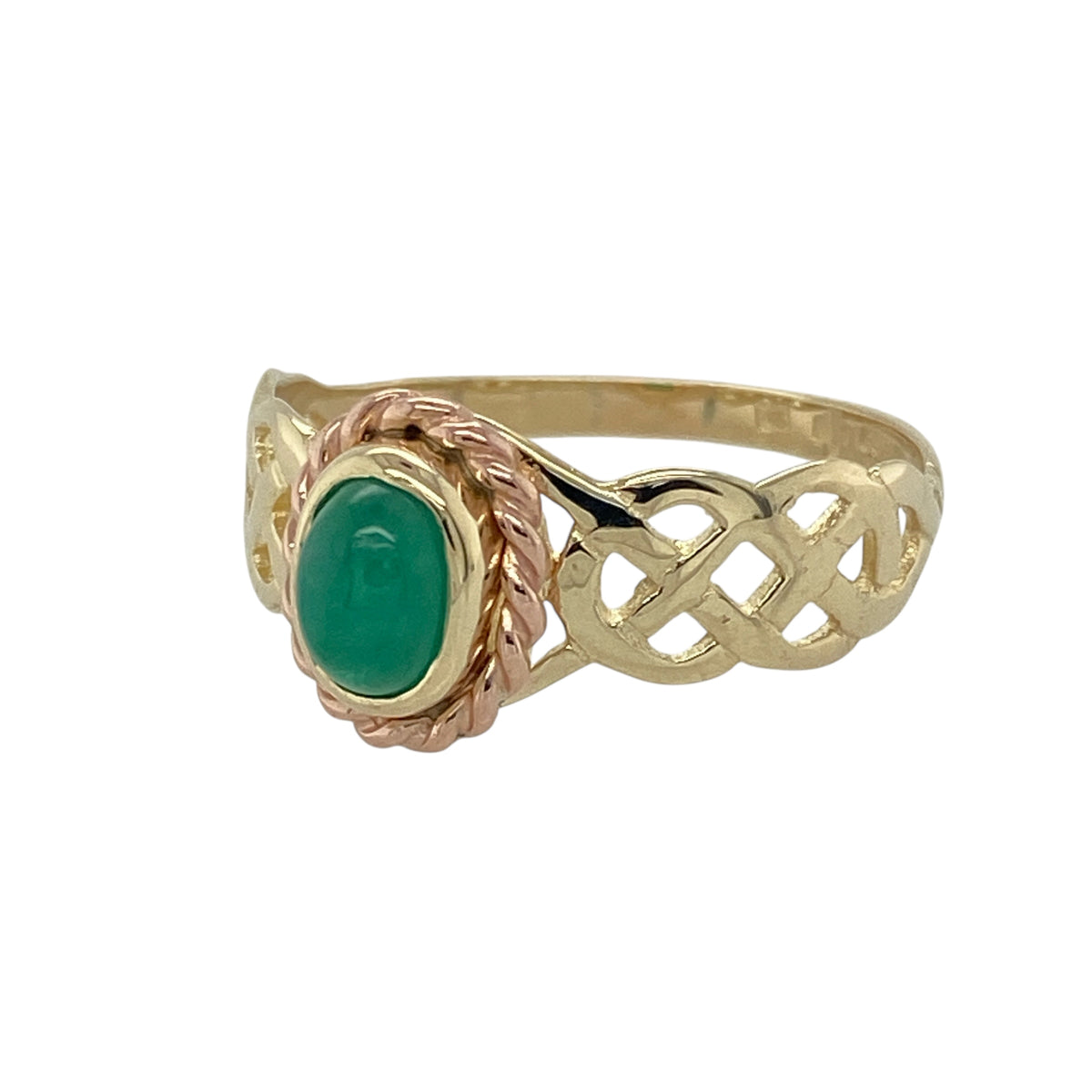 Bring meaningful heritage and vibrant colour to your jewellery collection with this pre-owned 9ct yellow and rose Welsh gold Celtic knot ring — a beautifully symbolic piece with a striking green centre stone.

Design: The ring features a 6mm by 4mm oval emerald-coloured stone at the centre, framed by an intricate Celtic knot pattern that represents unity, eternity, and enduring connection.