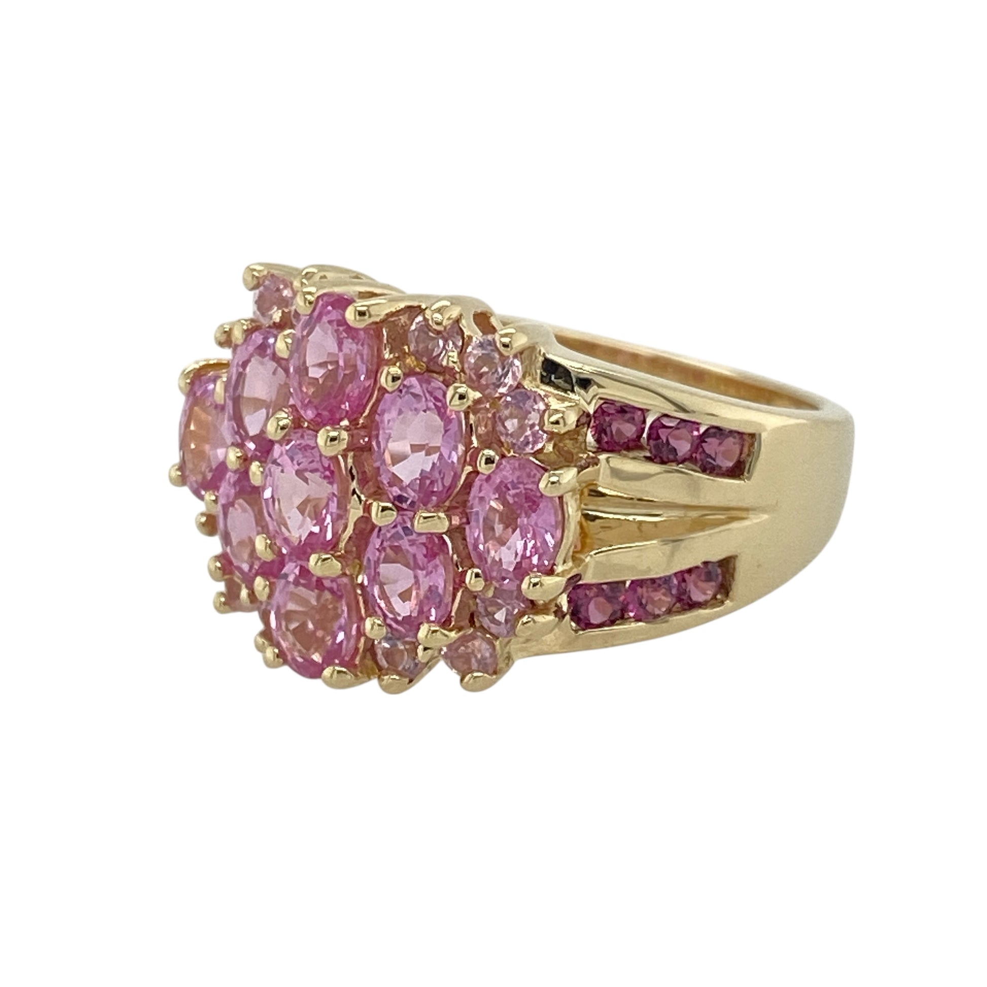 Bring bold colour and refined sparkle to your jewellery collection with this pre-owned 9ct yellow gold two-tone pink stone cluster ring — a striking piece with elegant presence and decorative detail.

Design: The front of the ring measures 12mm high and features a vibrant pink stone cluster accented by additional stones set along the shoulders, creating a bright and eye-catching display.