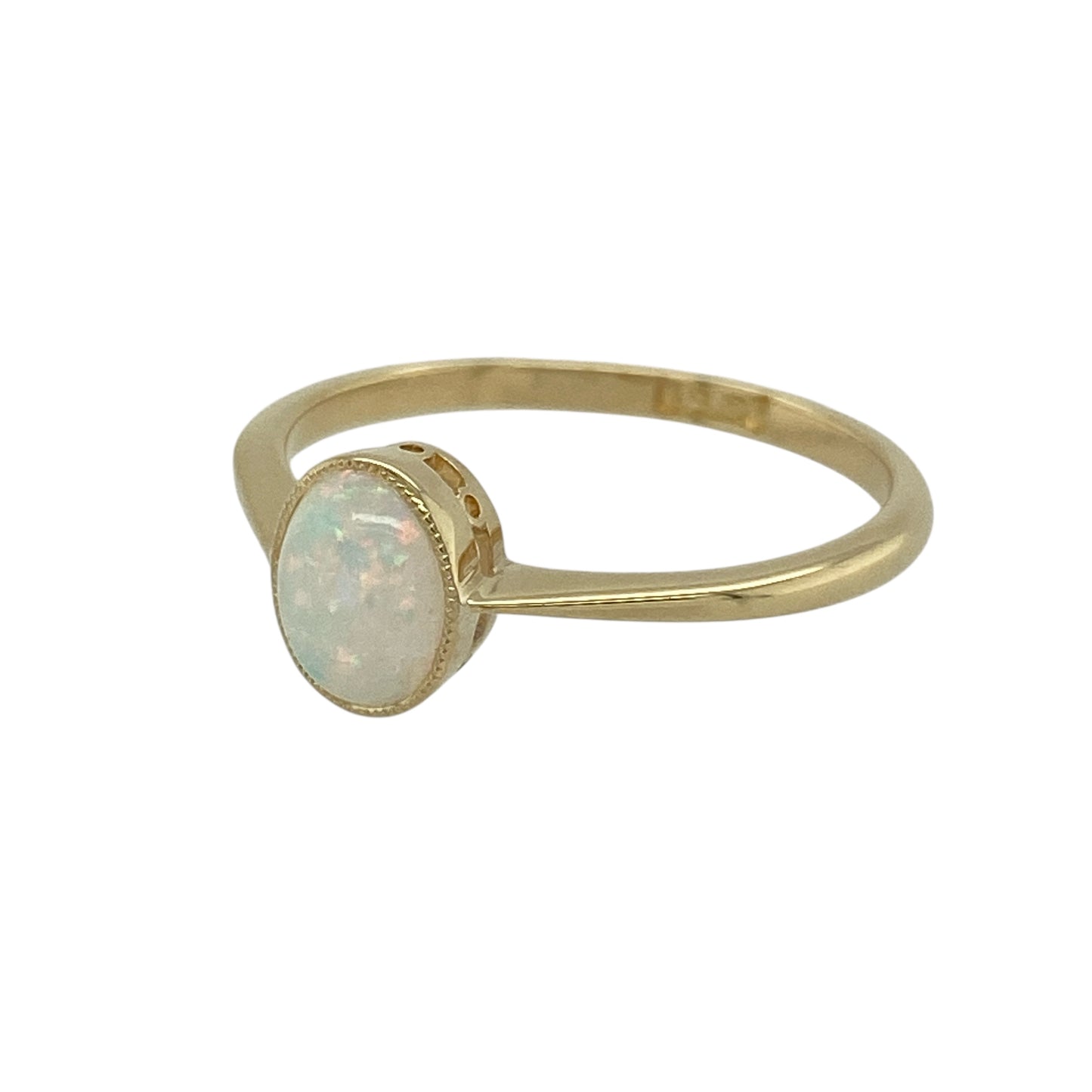 Bring soft colour and classic elegance to your jewellery collection with this pre-owned 18ct yellow gold opalique solitaire ring — a delicate piece with a gentle, iridescent glow.

Design: The ring features a 7mm by 5mm opalique stone, offering a smooth oval shape with luminous colour play for a graceful and captivating focal point.
Material: Made from 18ct yellow gold, the polished finish enhances the warm tone of the band and beautifully complements the soft shimmer of the opalique.