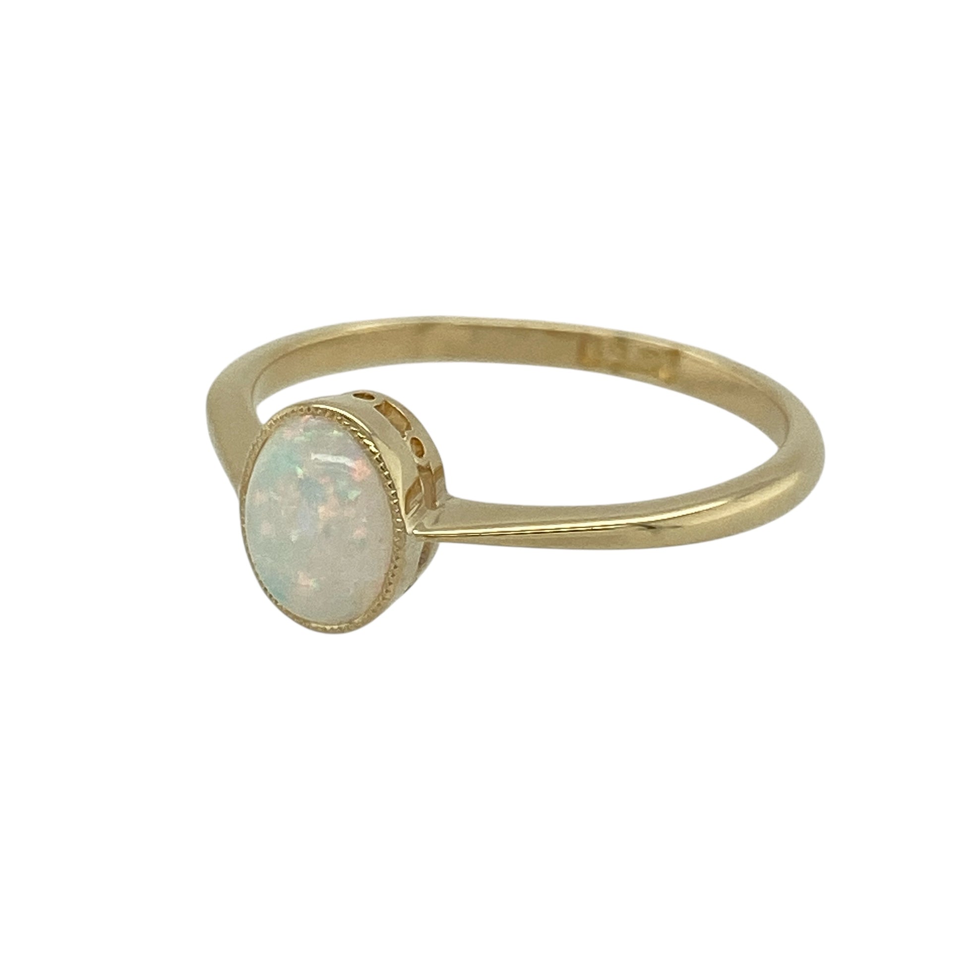 Bring soft colour and classic elegance to your jewellery collection with this pre-owned 18ct yellow gold opalique solitaire ring — a delicate piece with a gentle, iridescent glow.

Design: The ring features a 7mm by 5mm opalique stone, offering a smooth oval shape with luminous colour play for a graceful and captivating focal point.
Material: Made from 18ct yellow gold, the polished finish enhances the warm tone of the band and beautifully complements the soft shimmer of the opalique.