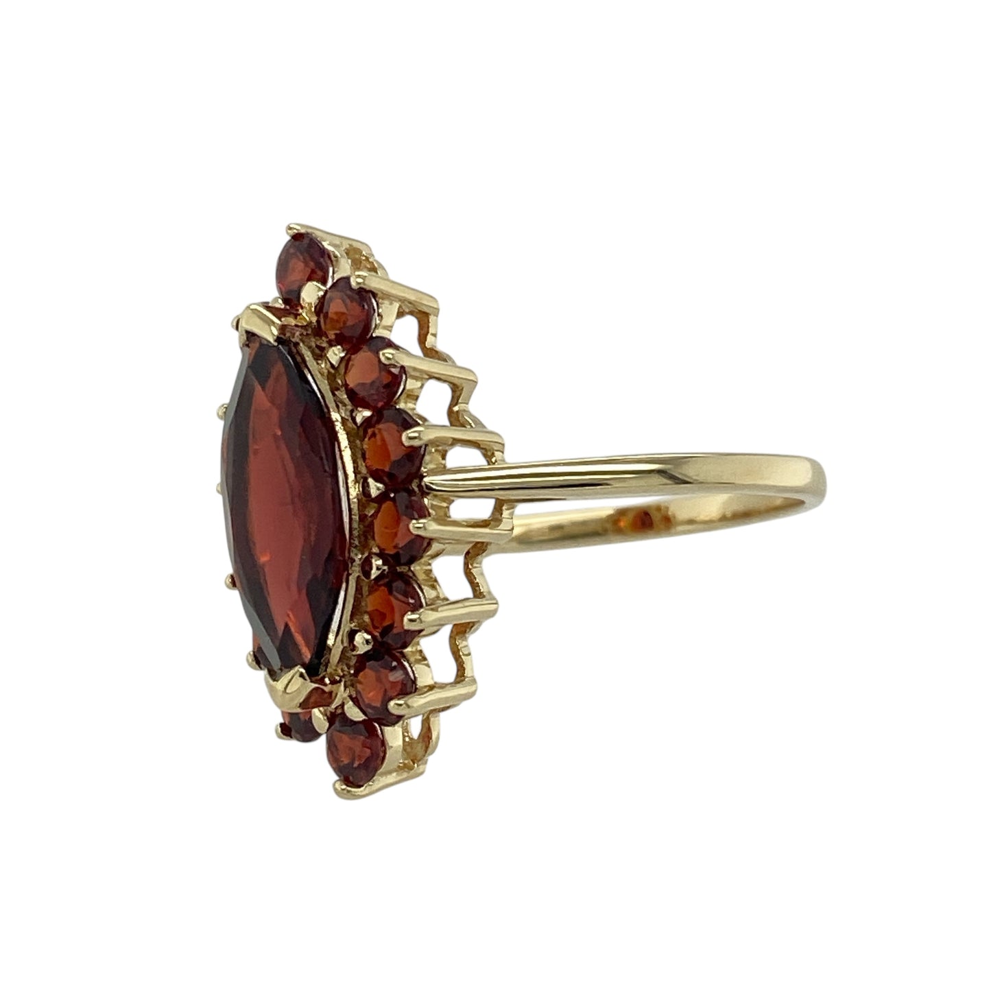 Bring rich colour and vintage-inspired elegance to your jewellery collection with this pre-owned 9ct yellow gold garnet cluster ring — a striking piece with bold presence and warm, luxurious depth.

Design: The ring features a 15mm by 7mm marquise-cut central garnet surrounded by smaller round garnets, creating a dramatic and beautifully balanced cluster arrangement.