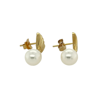Bring timeless elegance and soft lustre to your accessory collection with these pre-owned 9ct yellow gold pearl drop earrings — a graceful pair with classic charm.

Design: Each earring features a smooth, round pearl of approximately 7mm in diameter, suspended in a simple drop style that creates gentle movement and refined beauty.
Material: Made from 9ct yellow gold, the polished finish adds warmth and perfectly complements the natural sheen of the pearls.