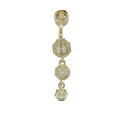 Bring bold sparkle and elegant movement to your jewellery collection with this pre-owned 9ct yellow gold cubic zirconia three-drop belly bar — a striking piece with eye-catching brilliance.

Design: The belly bar features a cascading trio of cubic zirconia stones, with the largest measuring 8mm in diameter, creating a bright and glamorous drop effect.
Material: Made from 9ct yellow gold, the polished finish enhances the warm tone of the metal and beautifully complements the sparkle of the stones.