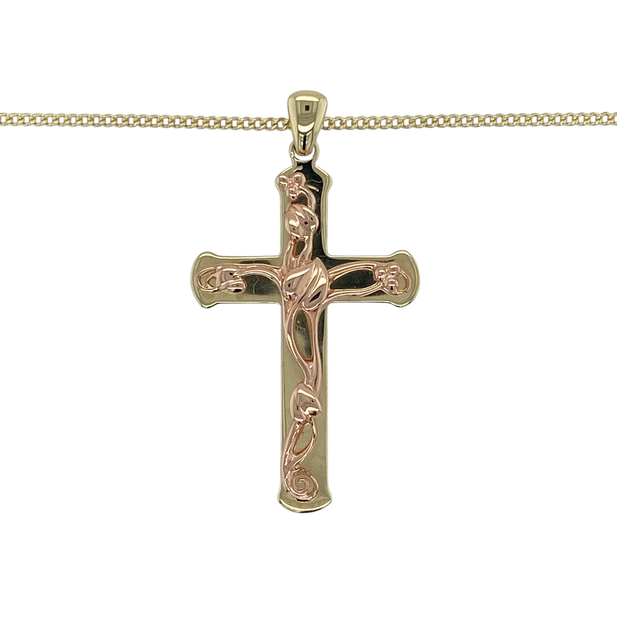 Bring meaningful symbolism and elegant craftsmanship to your jewellery collection with this pre-owned 9ct yellow and rose gold Clogau Tree of Life cross pendant on a 20" Clogau curb chain — a striking piece rich in heritage and detail.

Design: The pendant measures 4.2cm in length including the bail and features a beautifully detailed cross intertwined with the iconic Tree of Life motif, blending flowing branches and roots for a design full of significance.