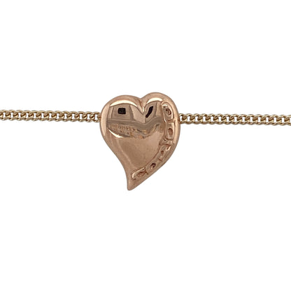 Bring heartfelt charm and elegant warmth to your jewellery collection with this pre-owned 9ct rose gold Clogau Cariad heart pendant on an 18" yellow gold curb chain — a meaningful piece celebrating love and connection.

Design: The pendant measures 1.5cm in length and features the iconic Clogau Cariad heart motif, showcasing graceful curves and sentimental design in soft rose gold. 