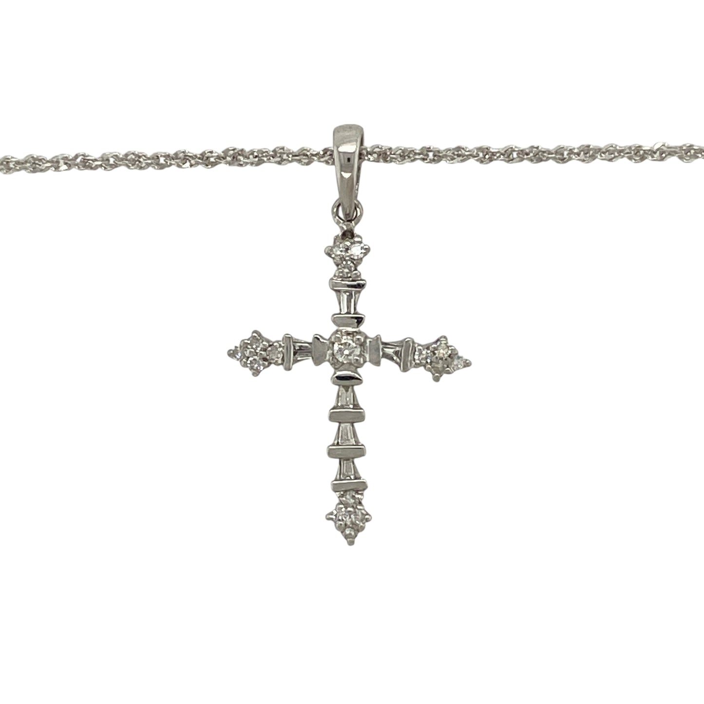 Bring meaningful elegance and refined sparkle to your jewellery collection with this pre-owned 9ct white gold diamond cross pendant on an 18" sparkle chain — a timeless piece with bright, graceful charm.

Design: The pendant measures 3cm in length including the bail and features a slender cross design accented with delicate diamonds, creating a beautiful blend of simplicity and brilliance.