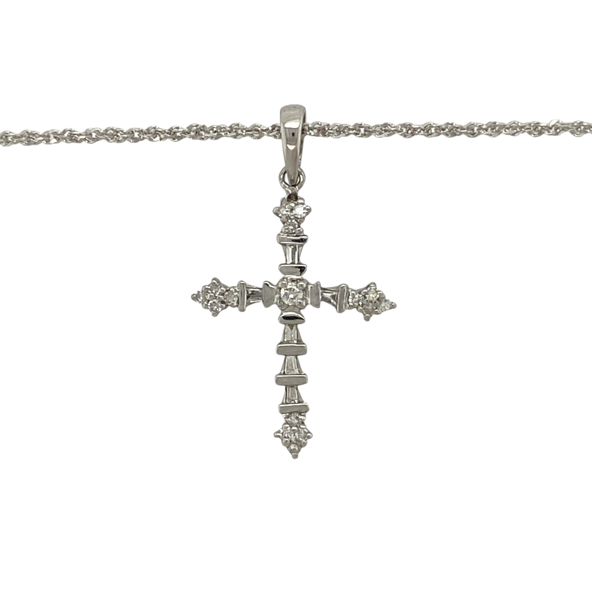Bring meaningful elegance and refined sparkle to your jewellery collection with this pre-owned 9ct white gold diamond cross pendant on an 18" sparkle chain — a timeless piece with bright, graceful charm.

Design: The pendant measures 3cm in length including the bail and features a slender cross design accented with delicate diamonds, creating a beautiful blend of simplicity and brilliance.