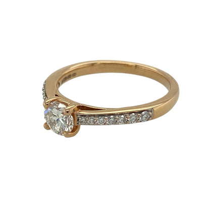 Bring timeless sparkle and refined elegance to your jewellery collection with this new 9ct yellow gold diamond solitaire ring — a classic piece enhanced with bright, modern detail.

Design: The ring features an impressive central diamond of approximately 0.50ct, complemented by diamond-set shoulders that add extra brilliance and sophistication.
Material: Made from 9ct yellow gold, the polished finish enhances the warm tone of the band and beautifully contrasts with the sparkle of the diamonds.