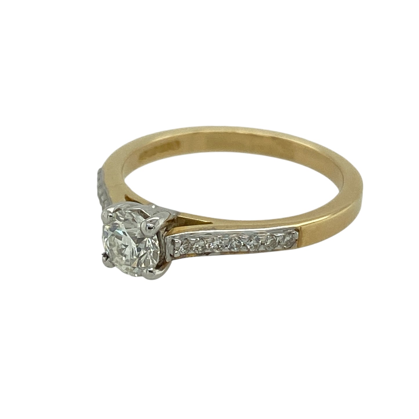 Bring exceptional sparkle and refined elegance to your jewellery collection with this new 9ct yellow gold diamond solitaire ring — a luxurious piece enhanced with shoulder-set diamonds for added brilliance.

Design: The ring features an impressive central brilliant-cut diamond of approximately 0.64ct, complemented by diamond-set shoulders that add extra shimmer and sophistication.