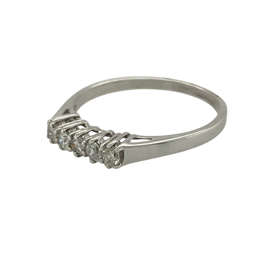 Bring classic sparkle and elegant simplicity to your jewellery collection with this new 9ct white gold five-stone diamond band ring — a timeless design with bright, refined brilliance.

Design: The ring features five brilliant-cut diamonds arranged across the band, offering a balanced and radiant display with a graceful, traditional look.
Material: Made from 9ct white gold, the polished finish enhances the cool, contemporary tone of the metal and beautifully complements the diamonds’ lively sparkle.