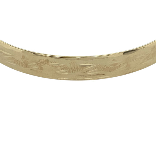 Bring timeless charm and heartfelt sentiment to your little one’s jewellery collection with this pre-owned 9ct yellow gold patterned expanding baby bangle—an elegant keepsake designed to grow alongside them.

Design: This sweet and stylish bangle features a decorative pattern around the band, adding gentle texture and a classic finish. Its expanding mechanism allows the diameter to adjust from 4.3cm when closed to 5.3cm when fully expanded, ensuring a comfortable and adaptable fit.