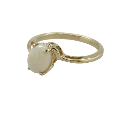 Bring soft iridescence and classic golden warmth to your collection with this pre-owned 9ct yellow gold opalique set ring—an elegant piece that offers gentle colour play and timeless charm.

Design: This graceful ring features an 8mm by 6mm oval opalique at its centre, displaying delicate flashes of colour that shift beautifully in the light. The polished band frames the stone with a simple yet refined look, allowing the opalique’s character to stand out.