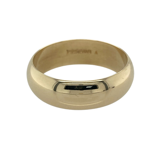 Bring classic elegance and enduring style to your collection with this pre-owned 9ct yellow gold 8mm wedding band ring—an iconic piece that offers timeless simplicity and a refined golden shine.

Design: This traditional band features a smooth, polished finish and a generous 8mm width, giving it a bold yet sophisticated presence. Its clean, rounded profile ensures a comfortable fit while maintaining a sleek, understated look.