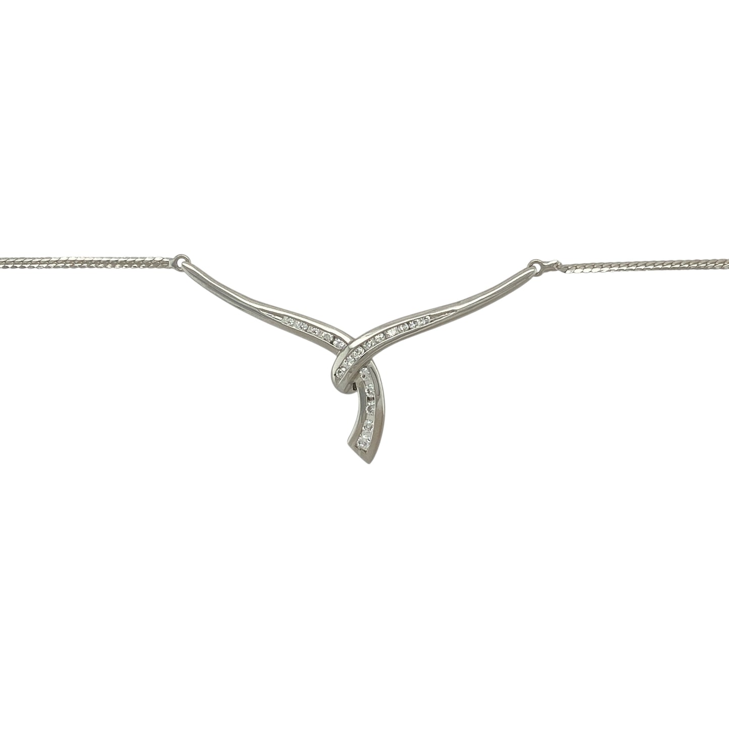Bring refined sparkle and contemporary elegance to your collection with this pre-owned 9ct white gold cubic zirconia wrap-over Y-shaped necklace—an eye-catching piece designed to sit gracefully along the neckline.

Design: This stylish necklace features a wrap-over Y-shaped drop adorned with bright cubic zirconia stones, creating a sleek, elongated silhouette that catches the light beautifully. The modern design adds movement and sophistication, making it perfect for both day and evening wear.
