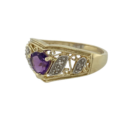 Bring vibrant colour and graceful symbolism to your collection with this pre-owned 9ct yellow and white gold diamond and amethyst wishbone ring—an elegant piece that blends sentiment, sparkle, and timeless style.

Design: This beautiful wishbone-style ring features a 6mm heart-shaped amethyst at the centre, offering a romantic focal point with rich purple colour. Diamond accents along the white gold curve add gentle sparkle, while the yellow gold band enhances the flowing, meaningful shape.