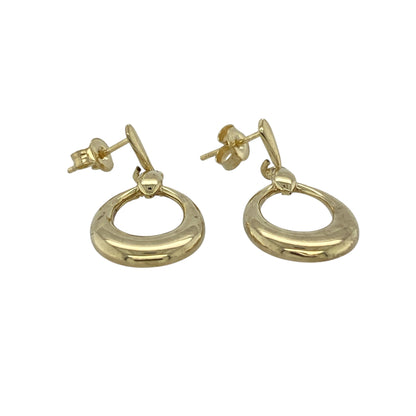 Bring classic elegance and warm golden shine to your collection with these pre-owned 9ct yellow gold oval drop earrings—timeless pieces that offer graceful movement and refined simplicity.

Design: These earrings feature smooth oval drops that create a clean, elongated silhouette with gentle movement. Their polished finish enhances the shape, adding a soft, radiant glow.