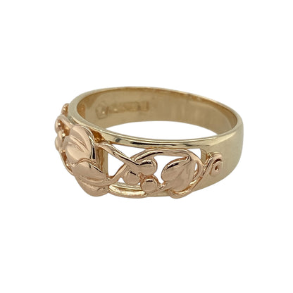 Bring meaningful symbolism and elegant two-tone style to your collection with this pre-owned 9ct yellow and rose gold Clogau Tree of Life ring—an iconic design celebrating growth, strength, and connection.

Design: This refined ring features the signature Tree of Life motif across an 8mm-wide front, blending flowing leaves and branches in a beautifully detailed pattern. The combination of yellow and rose gold adds depth and warmth, giving the design a distinctive and harmonious look.