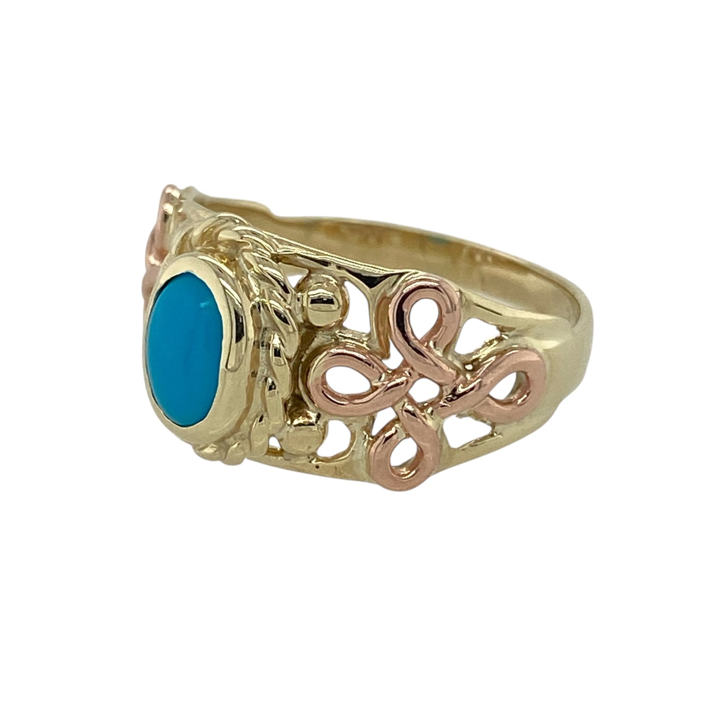 Bring vibrant colour and meaningful heritage to your collection with this pre-owned 9ct Welsh Cymru metal gold and turquoise Celtic ring—an expressive piece that blends traditional symbolism with striking gemstone beauty.

Design: This elegant ring features a 7mm by 4mm oval turquoise stone at the centre, offering bright blue colour and a bold focal point. The gemstone is framed by a Celtic-inspired design, adding depth, texture, and timeless cultural symbolism.