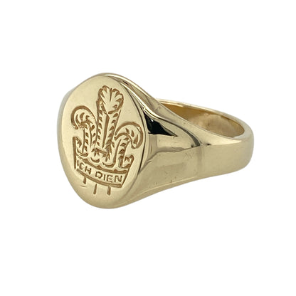 Bring timeless heritage and bold golden style to your collection with this pre-owned 9ct yellow gold Welsh Three Feathers signet ring—an iconic symbol presented with strong presence and refined detail.

Design: The front of the ring measures 14mm high and features the distinguished Welsh Three Feathers emblem, offering clear detail and cultural significance. The polished signet profile enhances the motif, creating a traditional yet striking look.