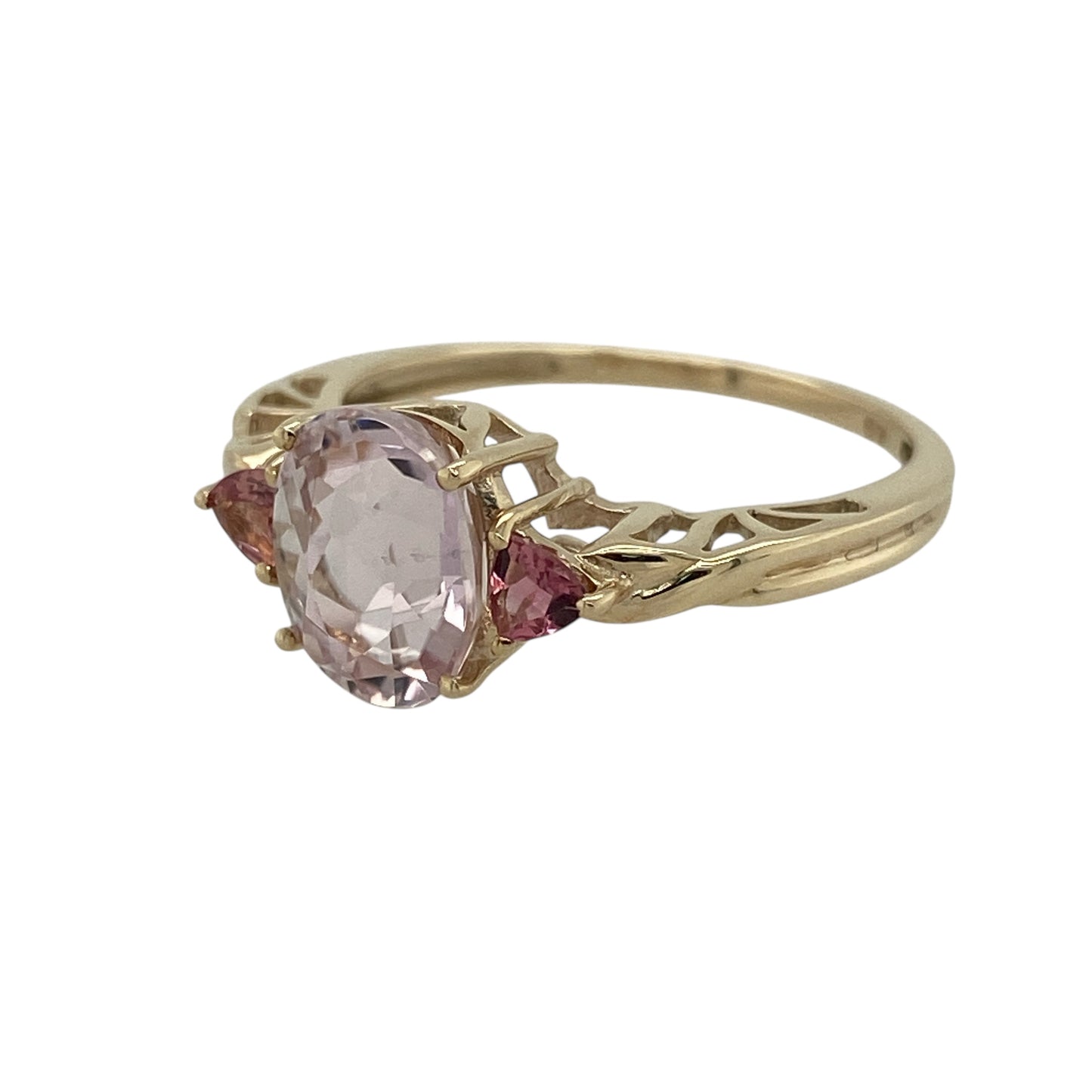Bring soft colour and elegant charm to your collection with this pre-owned 9ct yellow gold pink two-tone stone trilogy ring—an attractive piece that blends gentle hues with timeless styling.

Design: This pretty trilogy ring features a 9mm by 7mm light pink oval stone at the centre, framed by two 3mm darker pink stones on either side. The contrast in shades creates a graceful, feminine look with a balanced and eye-catching silhouette.