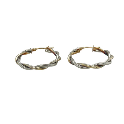 Bring modern elegance and refined simplicity to your collection with these pre-owned 9ct white gold twisted hoop creole earrings—stylish pieces with a clean, contemporary look.

Design: These hoops feature a subtle twisted creole design, adding gentle texture and visual interest while maintaining a sleek, classic silhouette. Their polished finish enhances the twist, creating a bright and sophisticated shine.