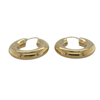 Bring bold simplicity and classic golden shine to your collection with these pre-owned 9ct yellow gold plain tube hoop creole earrings—timeless pieces with a strong, elegant presence.

Design: These hoops feature a smooth, polished tube design, creating a clean and sophisticated silhouette with excellent light reflection. Their thicker profile gives them a standout look while remaining effortlessly wearable.