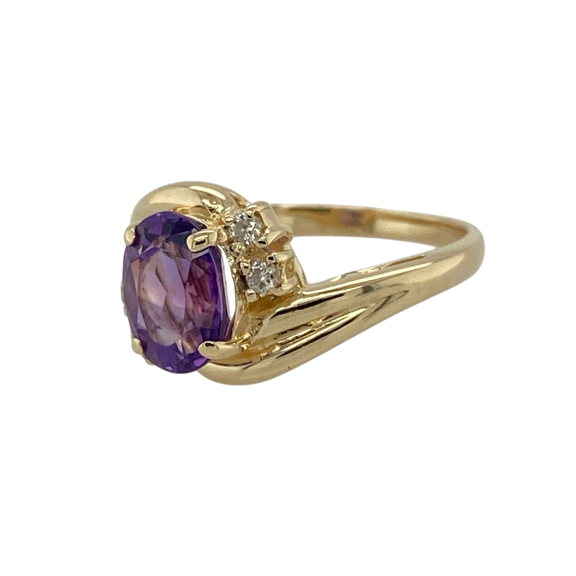 Bring rich colour and refined sparkle to your collection with this pre-owned 9ct yellow gold diamond and amethyst ring—an elegant piece with timeless gemstone appeal.

Design: This graceful ring features an 8mm by 6mm oval amethyst at the centre, offering deep purple colour and a beautifully balanced focal point. Diamond accents add subtle brilliance, enhancing the gemstone and giving the ring a refined, classic look.