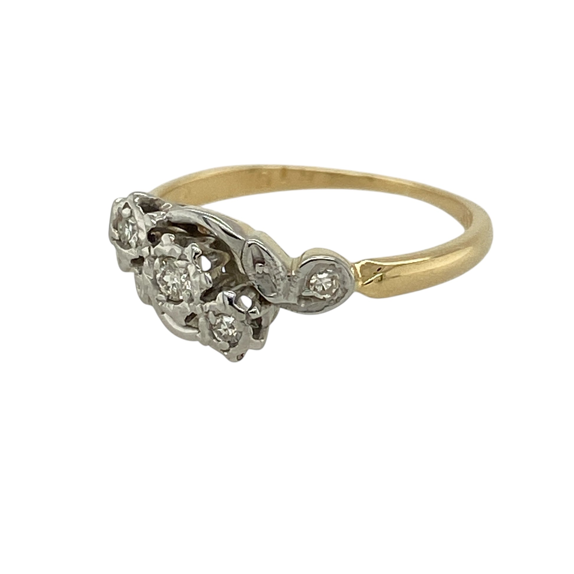 Bring refined elegance and classic contrast to your collection with this pre-owned 18ct yellow gold and platinum diamond trilogy twist ring—an elegant piece with timeless symbolism and graceful design.

Design: This beautiful trilogy ring features three diamonds arranged in a flowing twist setting, creating movement and a refined silhouette. The twist design adds a soft, contemporary feel while the trilogy layout symbolises past, present, and future.