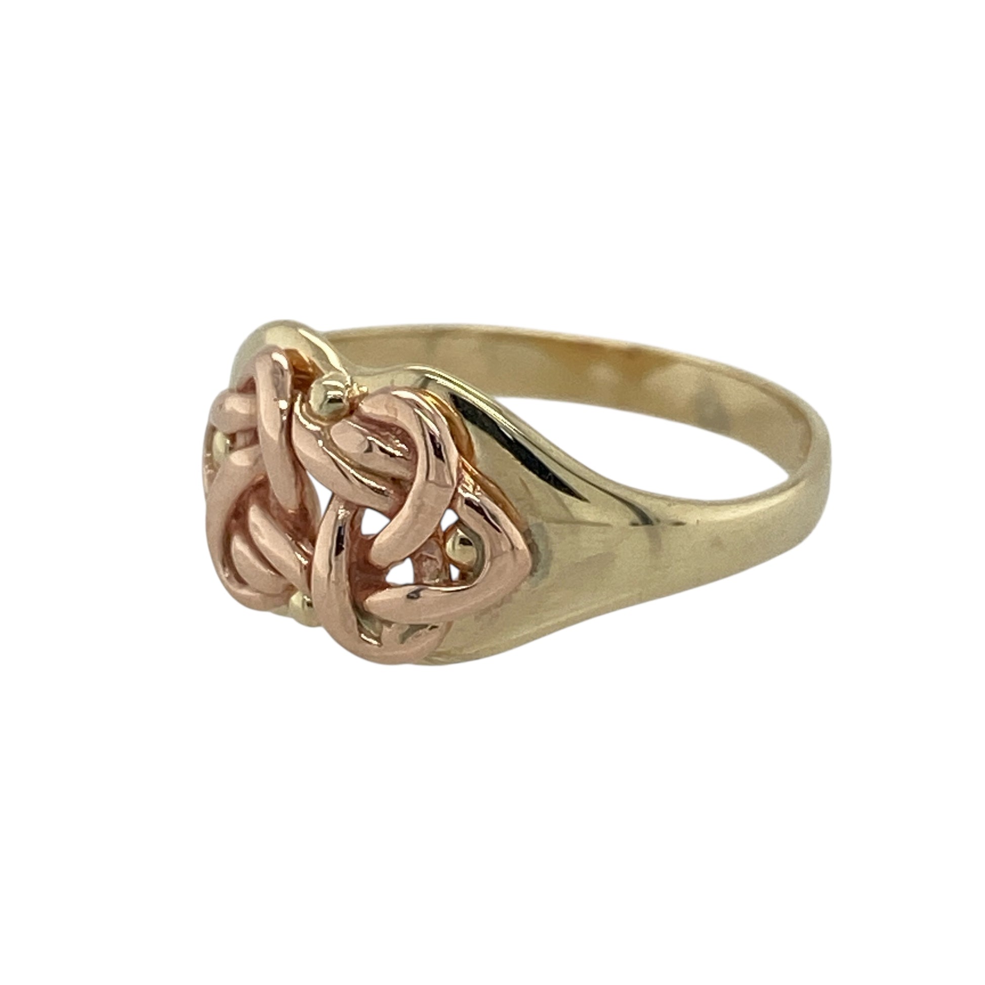 Bring meaningful heritage and elegant symbolism to your collection with this pre-owned 9ct yellow and rose Welsh Cymru gold Celtic knot ring—an expressive piece rooted in tradition and timeless design.

Design: The front of the ring measures approximately 9mm high and features an intricate Celtic knot motif, symbolising unity and eternity. The detailed knotwork creates a bold yet graceful focal point with strong cultural significance.