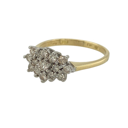 Bring eye-catching sparkle and classic elegance to your jewellery collection with this pre-owned 18ct yellow gold & diamond set cluster ring, offering a timeless design with impressive brilliance.

Design: The ring features a classic cluster arrangement, with multiple diamonds grouped together to create a bold and radiant focal point that maximises sparkle.
Material: Made from 18-carat yellow gold, the rich polished finish enhances the brightness of the diamonds and adds a warm, luxurious tone.