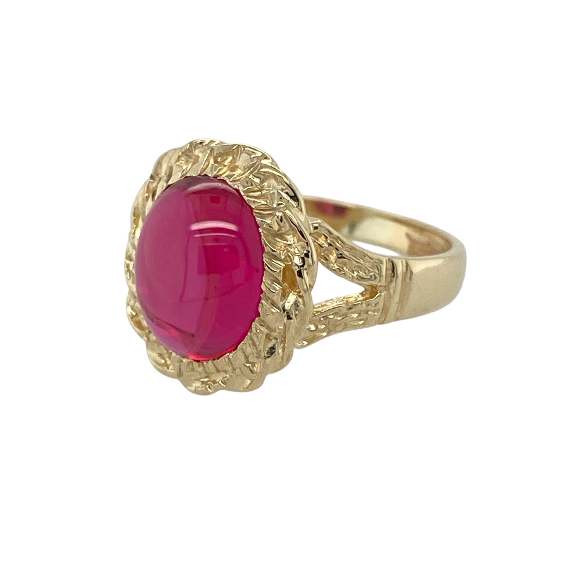 Bring vibrant colour and classic detail to your jewellery collection with this pre-owned 9ct yellow gold & pink stone set rope surround ring, offering a bold and elegant design.

Design: The ring features an oval pink ruby-coloured stone as the centrepiece, framed by a rope-style surround that adds texture and vintage-inspired charm.
Material: Made from 9-carat yellow gold, the warm polished finish beautifully complements the rich pink tone of the centre stone.