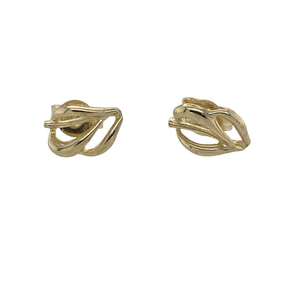 Bring natural elegance and understated charm to your jewellery collection with these pre-owned 9ct yellow gold open leaf design stud earrings, offering a graceful and timeless look.

Design: The earrings feature an open leaf motif, creating a light and flowing design inspired by nature with a delicate, airy silhouette.
Material: Made from 9-carat yellow gold, the warm polished finish enhances the organic shape and adds a soft golden glow.