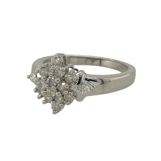 Bring elegant sparkle and timeless appeal to your jewellery collection with this pre-owned 9ct white gold & diamond set cluster ring, offering classic design and refined brilliance.

Design: The ring features a traditional cluster arrangement, with multiple diamonds grouped together to create a radiant and eye-catching focal point.
Material: Made from 9-carat white gold, the bright polished finish enhances the sparkle of the diamonds and gives the ring a clean, contemporary look.