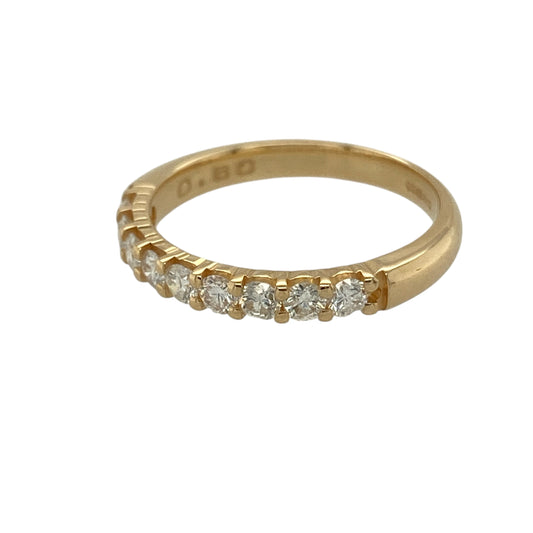 Bring timeless sparkle and refined elegance to your jewellery collection with this pre-owned 18ct yellow gold & diamond set band ring, offering classic design with impressive brilliance.

Design: The ring features a traditional band style with diamonds arranged neatly across the front, creating a clean and balanced look that suits both everyday wear and special occasions.
Material: Made from 18-carat yellow gold