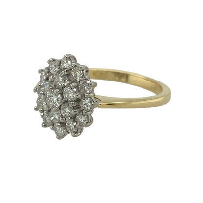 Bring eye-catching brilliance and classic elegance to your jewellery collection with this pre-owned 18ct yellow gold & diamond set oval-shaped cluster ring, offering a striking and timeless design.

Design: The ring features an oval-shaped cluster arrangement, with multiple diamonds grouped together to create a radiant and well-balanced focal point.
Material: Made from 18-carat yellow gold, the warm polished finish beautifully complements the sparkle of the diamonds and adds a luxurious tone.
